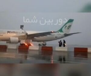 بارش برف در فرودگاه مشهد و پاشش مایع ضد یخ بر روى ایرباس ماهان توسط شرکت خدمات هوایی سامان