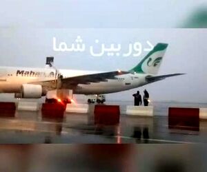 بارش برف در فرودگاه مشهد و پاشش مایع ضد یخ بر روى ایرباس ماهان توسط شرکت خدمات هوایی سامان