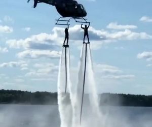 پرواز با فلای برد در کنار هلیکوپتر 
